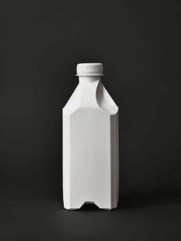 Pristine white milk carton with a cap, showcased against a dark background, perfect for product display and packaging concepts