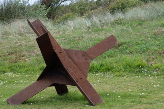 Normandy France D-Day a hedgehogs near WWII Utah Beach. Veterans Day rememberance. High quality photomontage