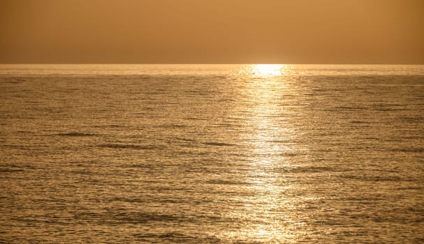 reflections of the setting sun in the Mediterranean sea