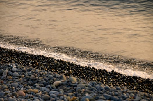 sunset reflection of the mediterranean sea in golden color at sunset 1