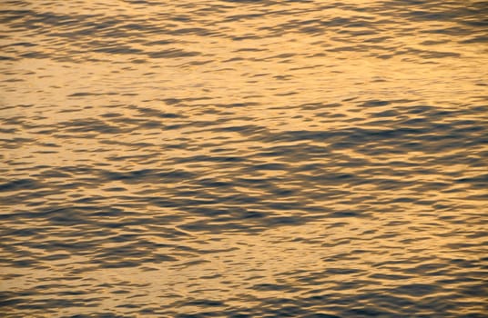 beautiful spring sunset of the Mediterranean sea golden waves at sunset 1