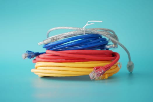 Stack of colorful elastic rubber bands on table ,