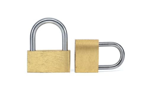 Two shiny gold padlocks that has a silver inner part isolated on white background