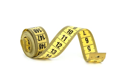 Yellow tape measure spirals creates a visual impression of motion isolated on white background