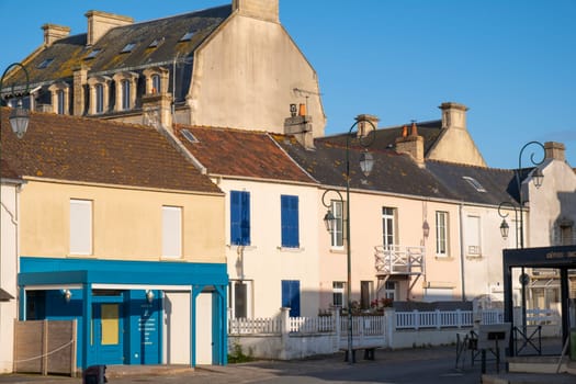 Normandy village of Gold Beach France. Tourism and architectural history. Seawall and promenade. High quality photo