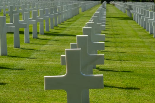 American cemetery at Normandy area. WWII memorial. Overhead view of lines of grave stones. High quality photo