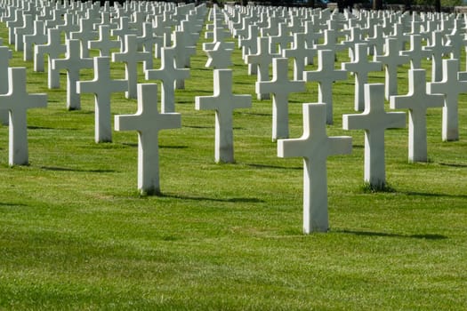 American cemetery at Normandy area. WWII memorial. Lines of grave stones. High quality photo