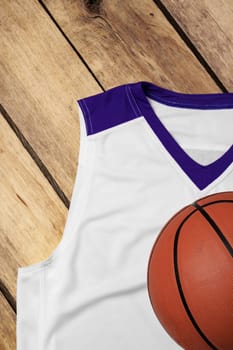 Basketball uniform on wooden background top view flat lay