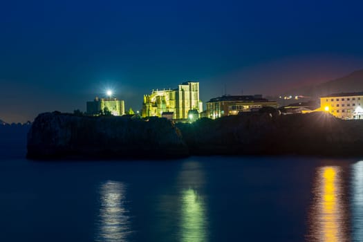 night view of View of the Church of Santa Maria de la Asuncion Castro Urdiales Santa Ana Castle.