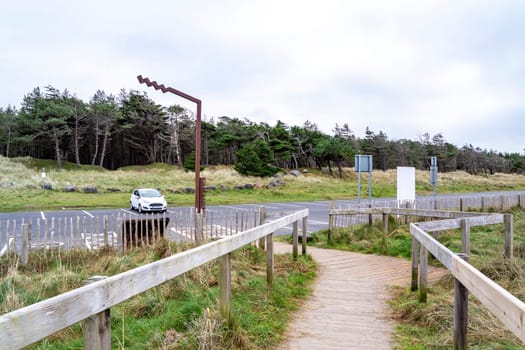 MURVAGH, COUNTY DONEGAL, IRELAND - JANUARY 21 2022 : The parking lot at the beach is almost empty.