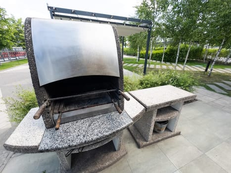 Outdoor BBQ grill. Barbecue open fireplace for cooking. High quality photo