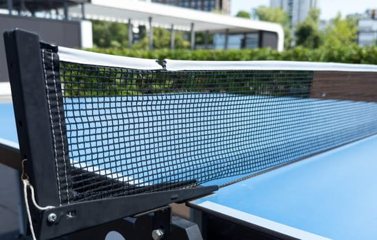 ping pong table in the garden. High quality photo