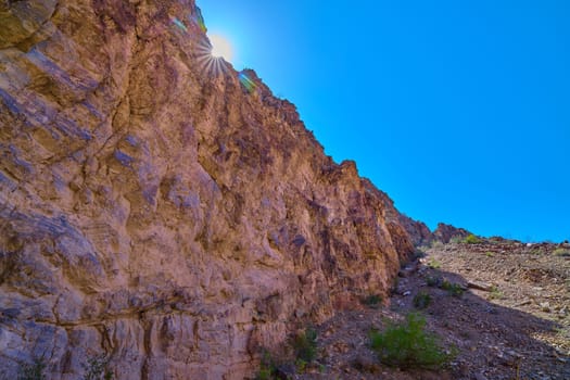 Rocky ledge with sun burst at Big Bend National Park, Texas.