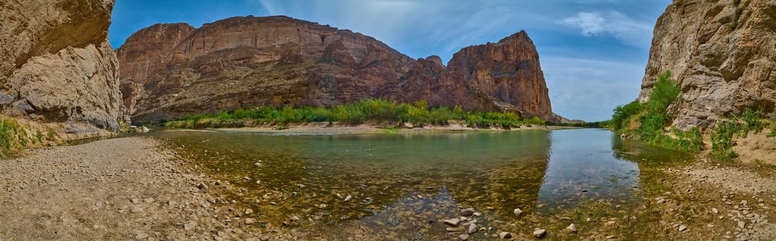 Panoramic view of the Rio Grande with the Walls of the Boquillas Canyon in Big Bend National Park, Texas.