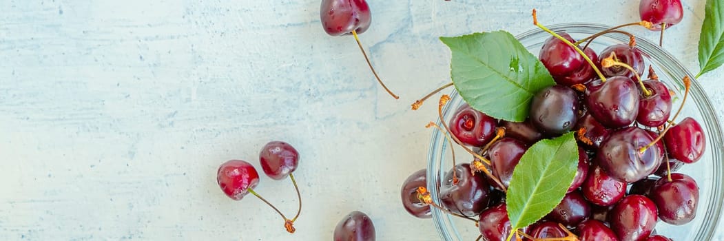 Banner of flat lay of cherry. sweet juicy cherries on white textured background. Summer healthy sweets concept. top view