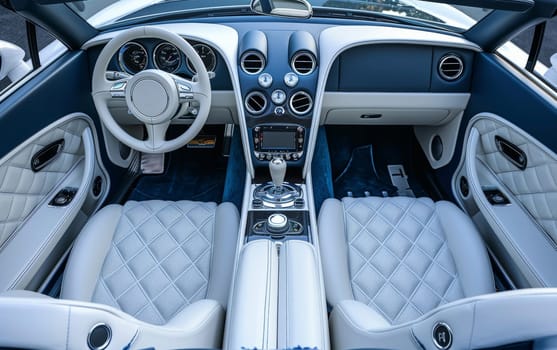 The picture presents a pristine white luxury car interior, with a detailed dashboard and quilted leather seats, reflecting a blend of elegance and advanced design