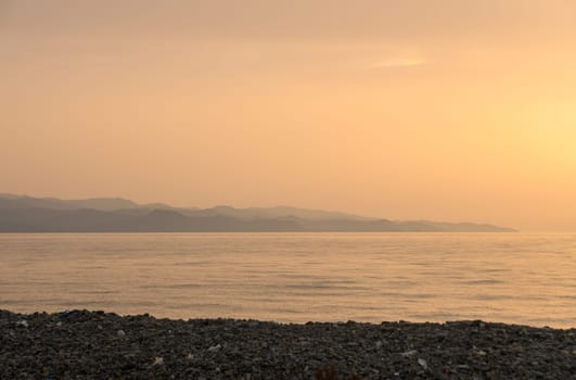 the reflection of the setting sun on the waves . beach and rest. concept of romance