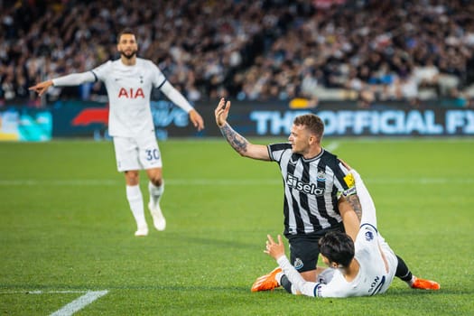 MELBOURNE, AUSTRALIA - MAY 22: Heung Min Son of Tottenham Hotspur and Kieran Trippier of Newcastle United clash during the Global Football Week at The Melbourne Cricket Ground on May 22, 2024 in Melbourne, Australia