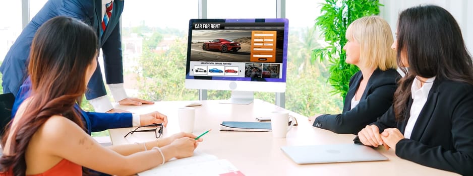 car rental website on computer screen for tourist to rent a car for transportation snugly