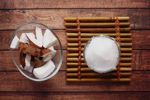 slice of fresh coconut on a table cloth .