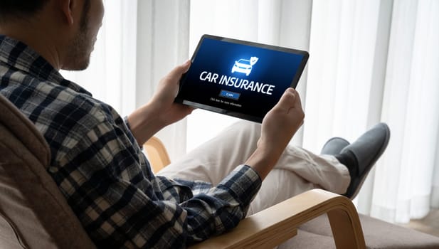 car insurance online website on computer screen for insure your car damage snugly