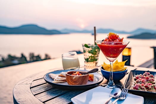 View of rooftop bar in Panwa beach at sunset, in Phuket, Thailand, south east Asia