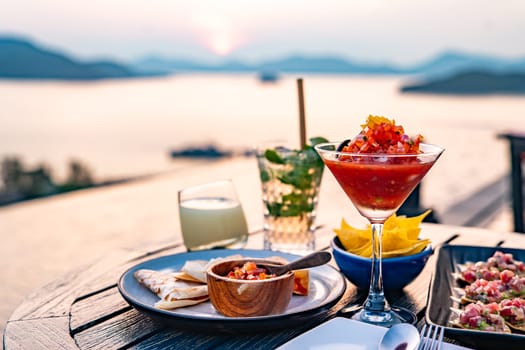 View of rooftop bar in Panwa beach at sunset, in Phuket, Thailand, south east Asia