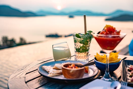 View of rooftop bar in Panwa beach at sunset, in Phuket, Thailand, south east Asia