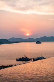 View of Cape Panwa beach at sunset, in Phuket, Thailand, south east Asia