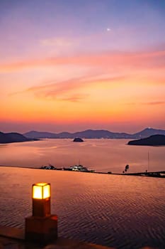 View of Cape Panwa beach at sunset, in Phuket, Thailand, south east Asia