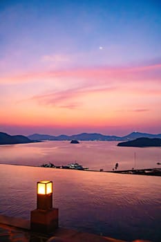 View of Cape Panwa beach at sunset, in Phuket, Thailand, south east Asia