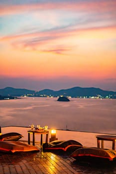 View of rooftop bar in Panwa beach at sunset, in Phuket, Thailand, south east Asia