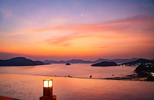 View of Cape Panwa beach at sunset, in Phuket, Thailand, south east Asia