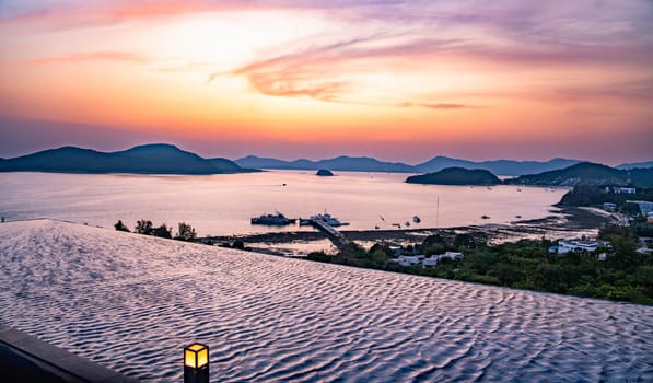 View of Cape Panwa beach at sunset, in Phuket, Thailand, south east Asia