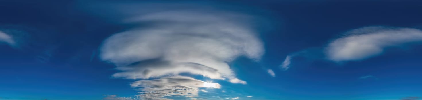 Blue sky with Cirrus clouds Seamless panorama in spherical equirectangular format. Complete zenith for use in 3D graphics, game and for composites in aerial drone 360 degree panoramas as a sky dome.