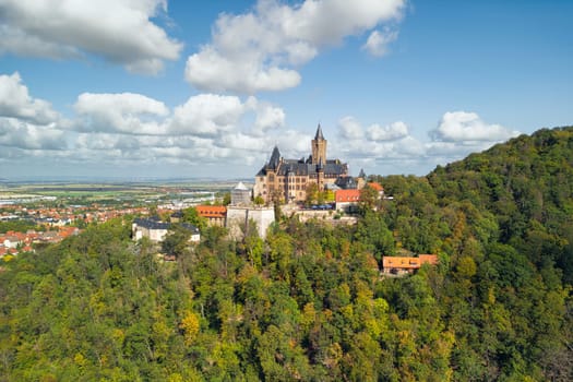 Aerial view of famous Castle Wernigerode, in beautiful golden evening light, Saxony-Anhalt, Germany