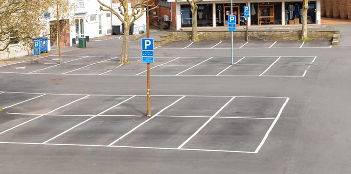 Empty car parking lot in the city. Bornholm, Denmark - May 15, 2024
