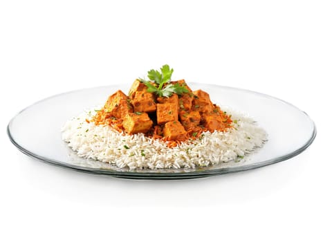 Vegetarian tofu tikka masala with basmati rice served on a transparent glass plate Indian inspired. Food isolated on transparent background.