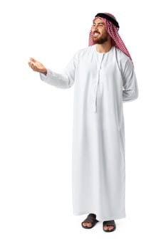 Young Arab man in traditional clothingpointing hand isolated on white background