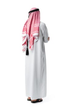 Back view of an Arab man standing on white isolated background close up