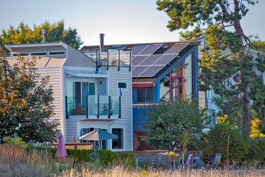 Front side of residential houses on ocean shore in Vancouver.