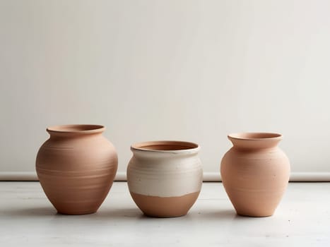 Group of empty clay pot standing on floor inside bright white studio background. Generative AI.