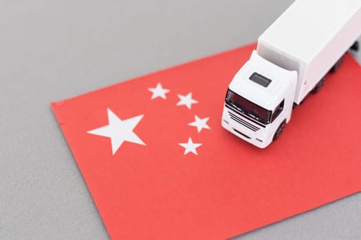 Delivery van with China flag. logistics concept. High quality photo