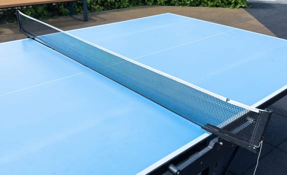 ping pong table in the garden. High quality photo