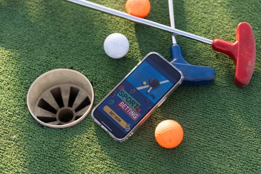 mini golf sports betting on a smartphone. High quality photo