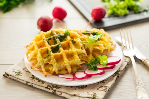 fried crispy vegetable potato waffles .