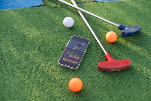 mini golf sports betting on a smartphone. High quality photo