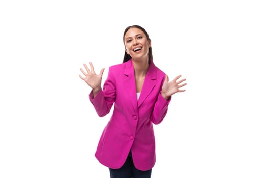 young brunette business woman dressed in a lilac suit on a white background with copy space.