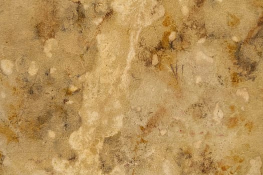 Detailed close-up of a veined marble countertop, showcasing its intricate patterns and smooth texture.