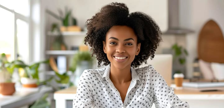 Portrait of beautiful happy smiling african young woman, female black girl looking at camera at home, curly hair, toothy smile